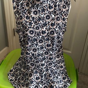 Peplum sleeveless blouse